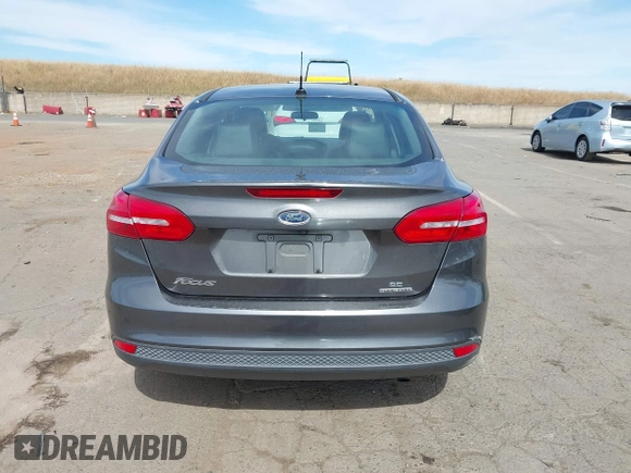 2018 Ford Focus SE z VIN 1FADP3F20JL327186, wystawiony jako IAAI lot #42271070 z przebiegiem 131 511 mil mil oraz . Historia ofert i sprzedaży dostępna na DreamBid. Obrazek 16.