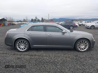 2011 Chrysler 300 with VIN 2C3CA6CT8BH547555, listed as a IAAI auction lot 41858626 with 141,853 mi miles. Bid and sale history available at carsss.com. Image 13.