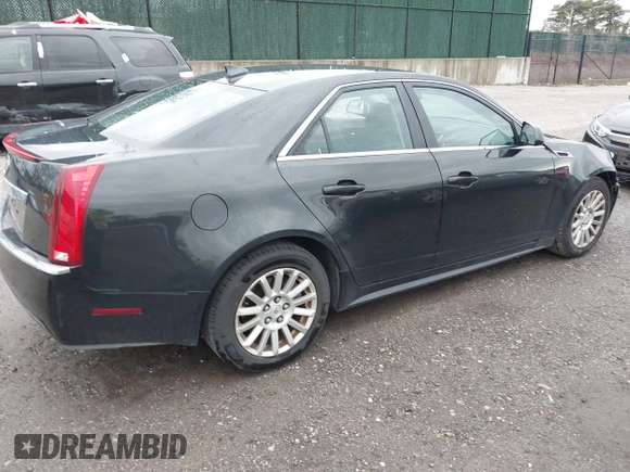 2011 Cadillac CTS z VIN 1G6DC5EY3B0107442, wystawiony jako IAAI lot #41918364 z przebiegiem 255 238 mil mil oraz . Historia ofert i sprzedaży dostępna na DreamBid. Obrazek 4.