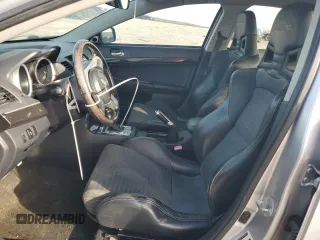 2011 Mitsubishi Lancer Evolution MR z VIN JA32W5FV3BU044656, wystawiony jako Copart lot #43448615 z przebiegiem 110 460 mil mil oraz Tytuł czysty. Historia ofert i sprzedaży dostępna na DreamBid. Obrazek 7.