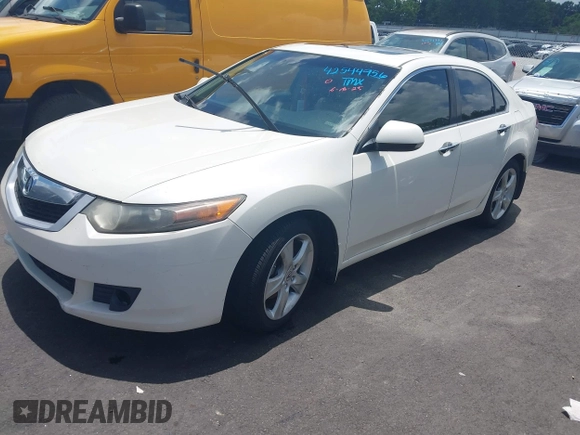 2010 Acura TSX with VIN JH4CU2F66AC014847, listed as a IAAI auction lot 42544956 with 244,252 mi miles and . Bid and sale history available at DreamBid. Image 2.