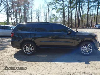 2016 Dodge Durango Limited with VIN 1C4RDJDG5GC302241, listed as a IAAI auction lot 41877415 with 135,586 mi miles and . Bid and sale history available at DreamBid. Image 13.
