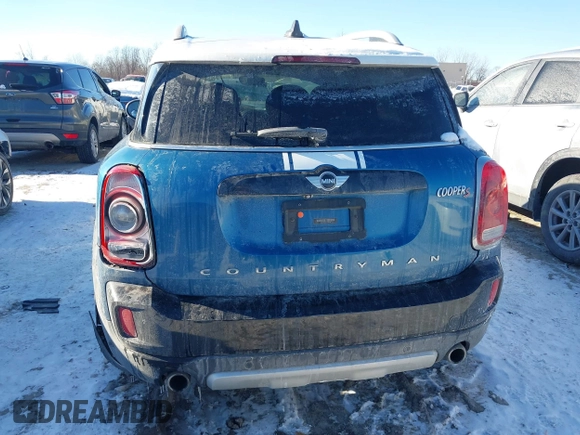 2018 MINI Countryman Cooper S with VIN WMZYT5C3XJ3E61612, listed as a IAAI auction lot 41276107 with 59,554 mi miles and . Bid and sale history available at DreamBid. Image 17.