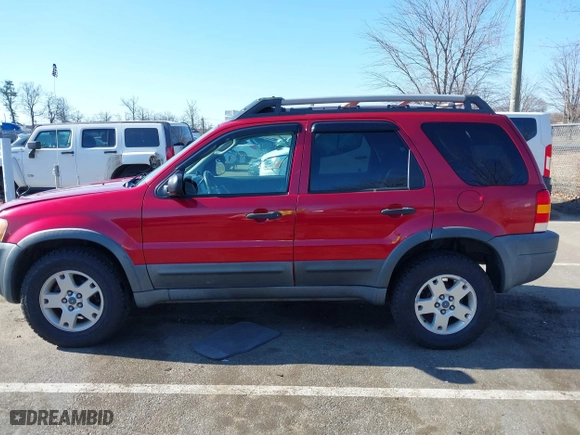 2003 Ford Escape XLT Popular 2 with VIN 1FMCU93183KC65571, listed as a IAAI auction lot 41768982 with 150,658 mi miles. Bid and sale history available at carsss.com. Image 14.