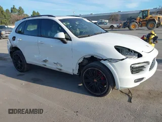 2013 Porsche Cayenne GTS with VIN WP1AD2A22DLA71143, listed as a IAAI auction lot 41287138 with 143,434 mi miles and . Bid and sale history available at DreamBid. Image 1.