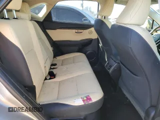 2020 Lexus NX 300h z VIN JTJGJRDZ6L2130945, wystawiony jako Copart lot #87912485 z przebiegiem 82 820 mil mil oraz Szkoda całkowita • Salvage title. Historia ofert i sprzedaży dostępna na DreamBid. Obrazek 10.