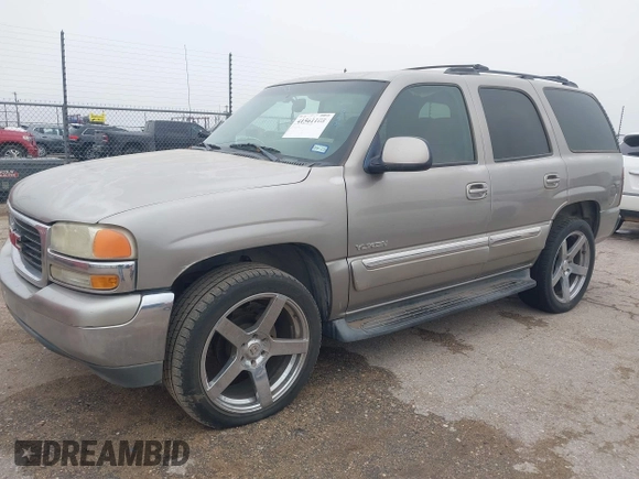 2003 GMC Yukon SLT with VIN 1GKEC13V33J287668, listed as a IAAI auction lot 41561108 with 326,719 mi miles. Bid and sale history available at carsss.com. Image 2.