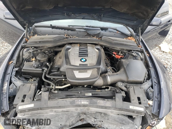 2007 BMW 6 Series 650i z VIN WBAEK13527CN83125, wystawiony jako Copart lot #79381004 z przebiegiem 140 844 mil mil oraz Szkoda całkowita • Salvage title. Historia ofert i sprzedaży dostępna na DreamBid. Obrazek 11.