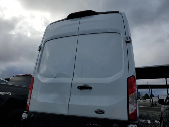 2023 Ford Transit Cargo z VIN 1FTBR1X8XPKB14862, wystawiony jako Copart lot #83661874 z przebiegiem Nie podano mil oraz Szkoda całkowita • Salvage title. Historia ofert i sprzedaży dostępna na DreamBid. Obrazek 6.
