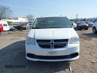 2016 Dodge Grand Caravan SXT with VIN 2C4RDGCG5GR275876, listed as a IAAI auction lot 42121344 with 140,652 mi miles. Bid and sale history available at carsss.com. Image 6.