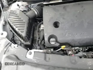 2023 Chevrolet Traverse Premier z VIN 1GNEVKKW6PJ295055, wystawiony jako Copart lot #67853075 z przebiegiem 74 072 mil mil oraz Szkoda całkowita • Salvage title. Historia ofert i sprzedaży dostępna na DreamBid. Obrazek 14.