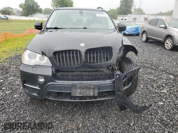 2012 BMW X5 35i with VIN 5UXZV4C57CL765053, listed as a Copart auction lot 59997275 with 157,943 mi miles and Salvage title. Bid and sale history available at DreamBid. Image 5.