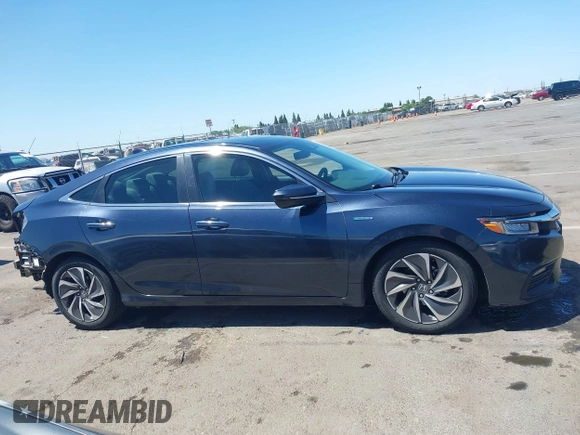 2022 Honda Insight Touring with VIN 19XZE4F90NE001251, listed as a IAAI auction lot 42303914 with 161,489 mi miles and . Bid and sale history available at DreamBid. Image 14.