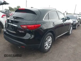 2016 Infiniti QX70 with VIN JN8CS1MU1GM130337, listed as a IAAI auction lot 42124059 with 148,876 mi miles and . Bid and sale history available at DreamBid. Image 4.