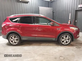 2014 Ford Escape Titanium with VIN 1FMCU9J9XEUD69589, listed as a IAAI auction lot 42031882 with 123,632 mi miles and . Bid and sale history available at DreamBid. Image 13.