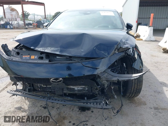 2021 Mazda 3 Premium Plus z VIN JM1BPBNY2M1403797, wystawiony jako IAAI lot #42031637 z przebiegiem Nie podano mil oraz . Historia ofert i sprzedaży dostępna na DreamBid. Obrazek 6.