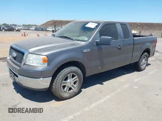 2007 Ford F-150 STX with VIN 1FTRX12W27FB43971, listed as a IAAI auction lot 42668899 with 142,834 mi miles and . Bid and sale history available at DreamBid. Image 2.