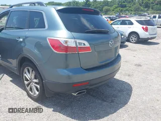 2012 Mazda CX-9 Grand Touring z VIN JM3TB2DA8C0354172, wystawiony jako IAAI lot #42739121 z przebiegiem 208 287 mil mil oraz . Historia ofert i sprzedaży dostępna na DreamBid. Obrazek 6.