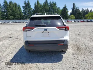 2021 Toyota RAV4 Hybrid LE with VIN JTMM6RFVXMD018561, listed as a Copart auction lot 60475965 with 56,074 mi miles and Salvage title. Bid and sale history available at DreamBid. Image 6.