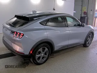 2022 Ford Mustang Mach-E Select z VIN 3FMTK1RM9NMA22355, wystawiony jako IAAI lot #42200313 z przebiegiem 30 284 mil mil oraz . Historia ofert i sprzedaży dostępna na DreamBid. Obrazek 1.