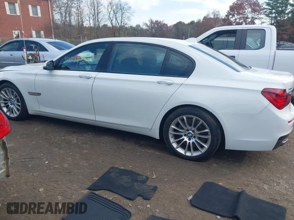 2015 BMW 7 Series 750Li xDrive with VIN WBAYF8C56FD654765, listed as a IAAI auction lot 40734550 with 133,848 mi miles and . Bid and sale history available at carsss.com. Image 14.