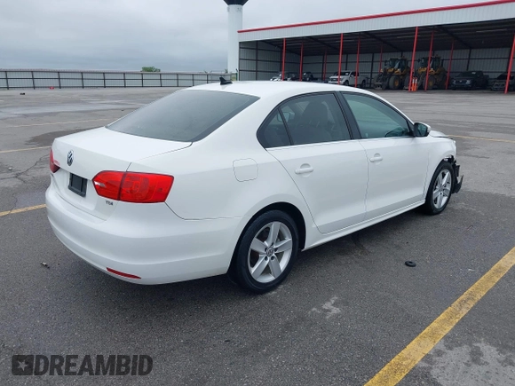 2014 Volkswagen Jetta TDI w/Premium with VIN 3VWLL7AJXEM372547, listed as a IAAI auction lot 42320105 with 113,200 mi miles and . Bid and sale history available at DreamBid. Image 4.