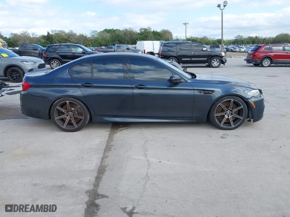 2013 BMW M5 with VIN WBSFV9C59DD096774, listed as a IAAI auction lot 41608286 with 82,601 mi miles. Bid and sale history available at carsss.com. Image 13.
