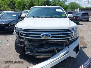 2019 Ford Expedition XLT z VIN 1FMJU1HT1KEA85882, wystawiony jako IAAI lot #42127179 z przebiegiem 110 173 mil mil oraz . Historia ofert i sprzedaży dostępna na DreamBid. Obrazek 12.