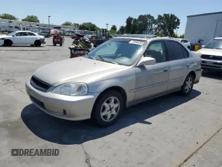 2000 Honda Civic EX with VIN 1HGEJ8649YL056686, listed as a Copart auction lot 58566265 with 27,952 mi miles and Salvage title. Bid and sale history available at DreamBid. Image 1.