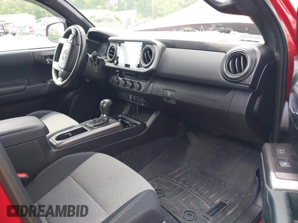 2021 Toyota Tacoma SR z VIN 5TFCZ5AN2MX263159, wystawiony jako IAAI lot #42273087 z przebiegiem 69 220 mil mil oraz . Historia ofert i sprzedaży dostępna na DreamBid. Obrazek 5.