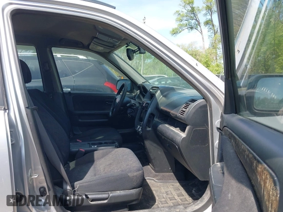 2005 Honda CR-V LX with VIN JHLRD78525C040139, listed as a IAAI auction lot 42097811 with 306,718 mi miles. Bid and sale history available at carsss.com. Image 5.