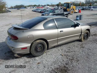 2001 Pontiac Sunfire SE z VIN 1G2JB124017254356, wystawiony jako IAAI lot #42070007 z przebiegiem Nie podano mil oraz . Historia ofert i sprzedaży dostępna na DreamBid. Obrazek 4.