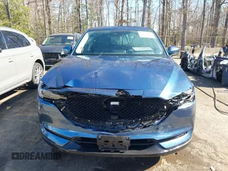 2020 Mazda CX-5 Grand Touring with VIN JM3KFBDM9L0756826, listed as a IAAI auction lot 41866290 with 145,567 mi miles. Bid and sale history available at carsss.com. Image 12.