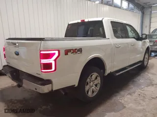 2020 Ford F-150 XL with VIN 1FTEW1E45LFA38928, listed as a IAAI auction lot 40393643 with 121,584 mi miles. Bid and sale history available at carsss.com. Image 4.