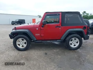 2012 Jeep Wrangler Sport with VIN 1C4AJWAG3CL197295, listed as a IAAI auction lot 42349118 with 117,381 mi miles and . Bid and sale history available at DreamBid. Image 14.