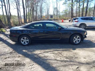 2014 Dodge Charger SE with VIN 2C3CDXBG3EH129796, listed as a IAAI auction lot 41773595 with 172,990 mi miles and . Bid and sale history available at DreamBid. Image 14.