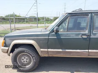 1994 Jeep Cherokee z VIN 1J4FT78S0RL149062, wystawiony jako IAAI lot #41925110 z przebiegiem 281 893 mil mil oraz . Historia ofert i sprzedaży dostępna na DreamBid. Obrazek 13.