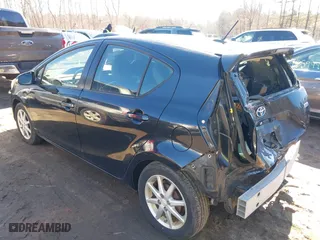 2013 Toyota Prius c One with VIN JTDKDTB36D1034076, listed as a IAAI auction lot 41622385 with 148,920 mi miles. Bid and sale history available at carsss.com. Image 3.