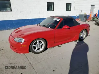 2001 Mazda MX-5 Miata with VIN JM1NB353310217256, listed as a Copart auction lot 46870555 with 127,396 mi miles and Salvage Title. Bid and sale history available at DreamBid. Image 1.