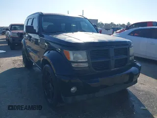 2007 Dodge Nitro SLT with VIN 1D8GT58K97W666680, listed as a IAAI auction lot 41573904 with 171,795 mi miles. Bid and sale history available at carsss.com. Image 1.