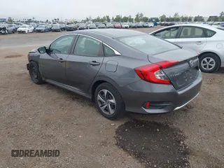 2020 Honda Civic LX with VIN 2HGFC2F63LH567698, listed as a IAAI auction lot 42354886 with 70,977 mi miles and . Bid and sale history available at DreamBid. Image 3.