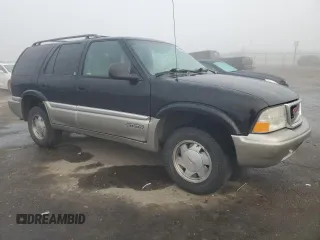 1998 GMC Jimmy SL with VIN 1GKCS13W8W2572514, listed as a Copart auction lot 83016224 with 85,044 mi miles and Salvage Title. Bid and sale history available at carsss.com. Image 4.