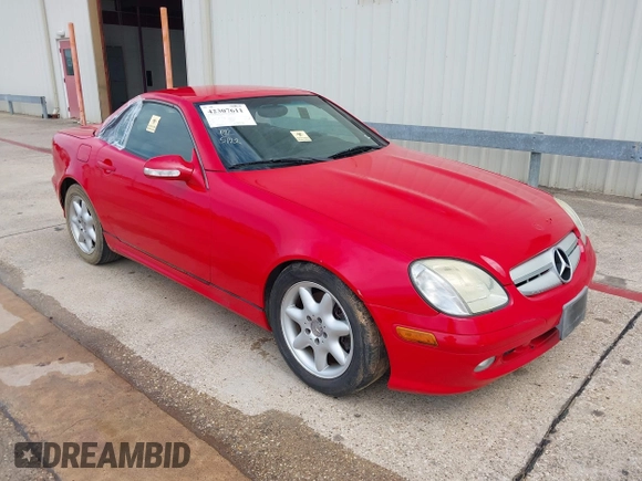 2001 Mercedes-Benz SLK 230/320 z VIN WDBKK65F31F223603, wystawiony jako IAAI lot #42307611 z przebiegiem 136 357 mil mil oraz . Historia ofert i sprzedaży dostępna na DreamBid. Obrazek 1.