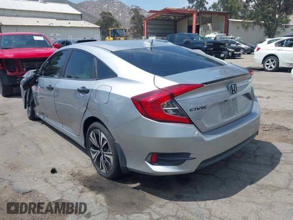 2018 Honda Civic EX-L z VIN JHMFC1F79JX037843, wystawiony jako IAAI lot #42121623 z przebiegiem 49 759 mil mil oraz . Historia ofert i sprzedaży dostępna na DreamBid. Obrazek 3.