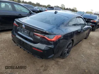2023 BMW 4 Series M440i xDrive with VIN WBA13AR09PCM73339, listed as a Copart auction lot 74730934 with 13,704 mi miles and Salvage Title. Bid and sale history available at DreamBid. Image 3.