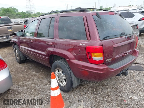 2000 Jeep Grand Cherokee Limited with VIN 1J4GW58N4YC423095, listed as a IAAI auction lot 42275933 with 135,684 mi miles and . Bid and sale history available at DreamBid. Image 3.