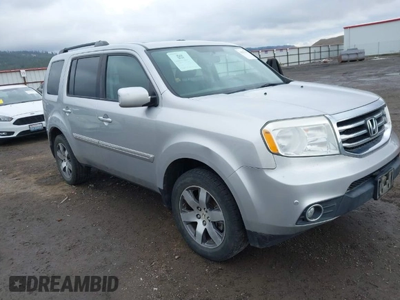 2015 Honda Pilot Touring with VIN 5FNYF4H94FB018152, listed as a IAAI auction lot 41812170 with 130,661 mi miles. Bid and sale history available at carsss.com. Image 1.