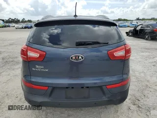 2012 Kia Sportage LX z VIN KNDPB3A29C7240993, wystawiony jako Copart lot #61408165 z przebiegiem 171 453 mil mil oraz Czysty tytuł • Clean title. Historia ofert i sprzedaży dostępna na DreamBid. Obrazek 6.