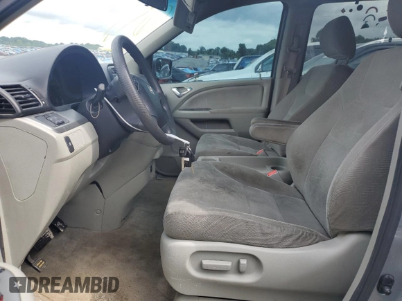 2010 Honda Odyssey EX with VIN 5FNRL3H48AB086975, listed as a Copart auction lot 60258265 with 184,344 mi miles and Salvage title. Bid and sale history available at DreamBid. Image 7.