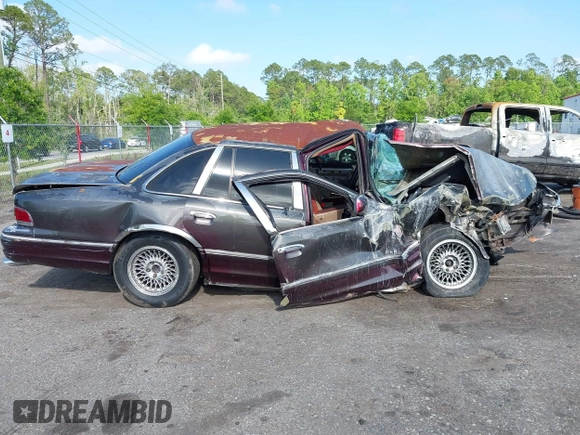 1994 Ford Crown Victoria LX с VIN 2FALP74W1RX133239, выставлен на аукционе IAAI как лот 42020257 с пробегом 110 463 миль миль и . История ставок и продаж доступна на DreamBid. Изображение 13.